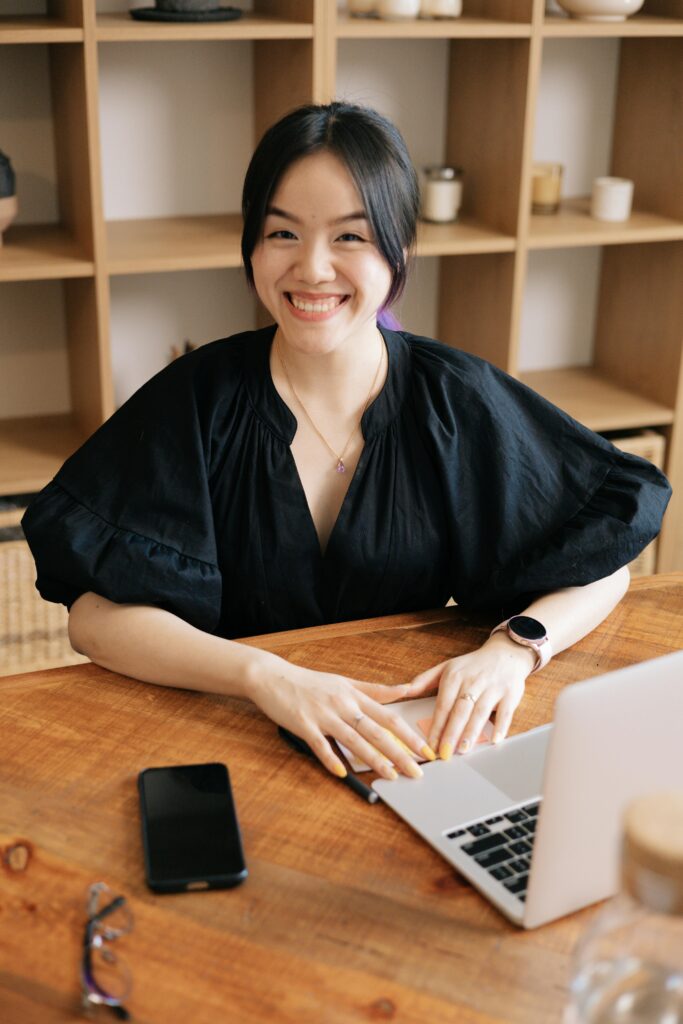 Happy Worker female at desk