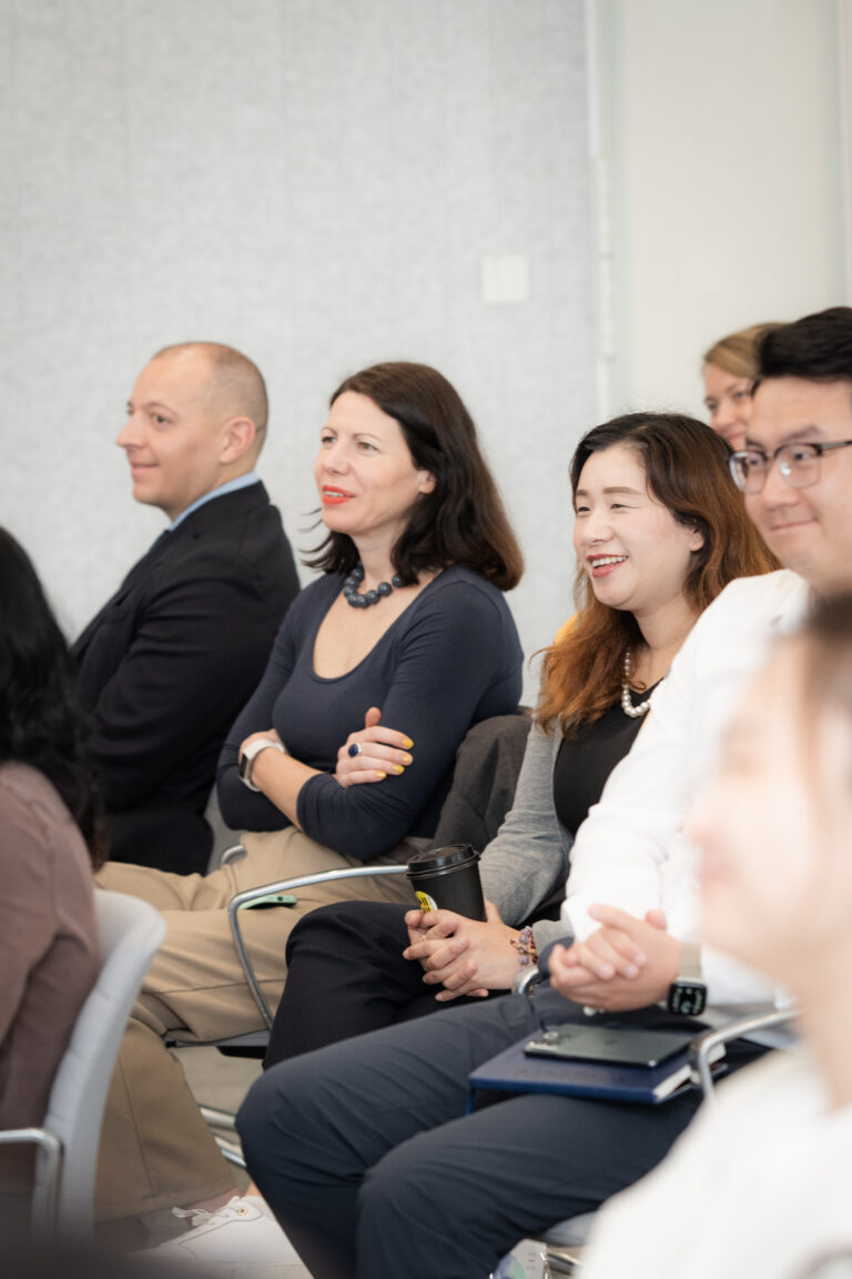 Participants listening to the panel