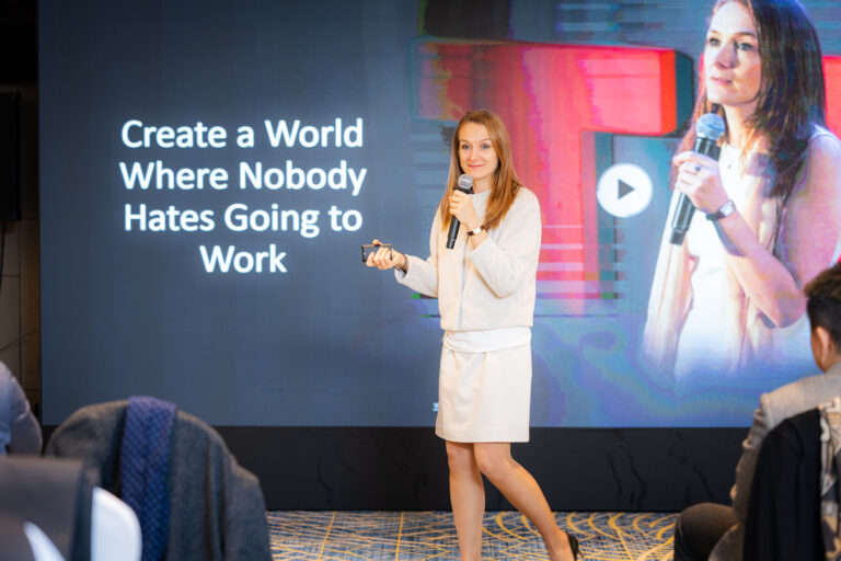 Marion Campan speaking at conference