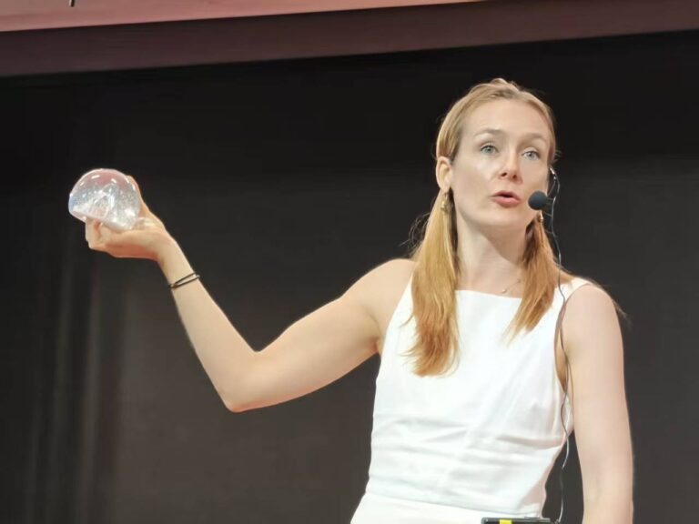 Marion Showing Snowglobe at TEDx