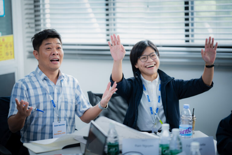 2 training participants smiling