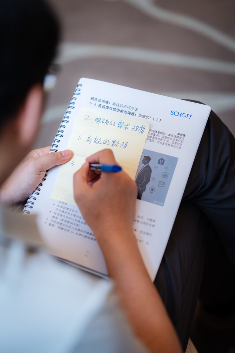 Participant writing on Workbook HR Positive Feedback Training