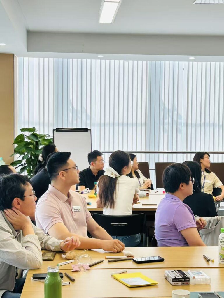 employees discussing communication challenges in China
