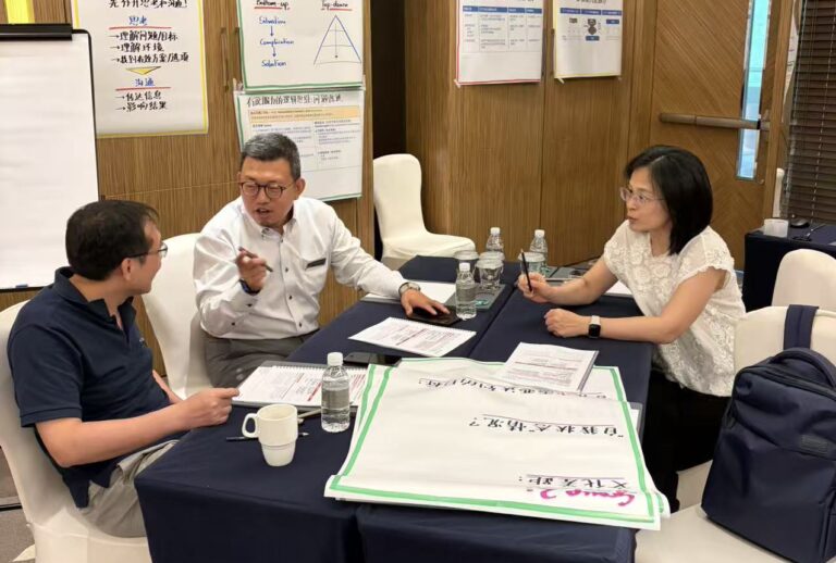 Small group case study discussion during Speak Up Program Session 3